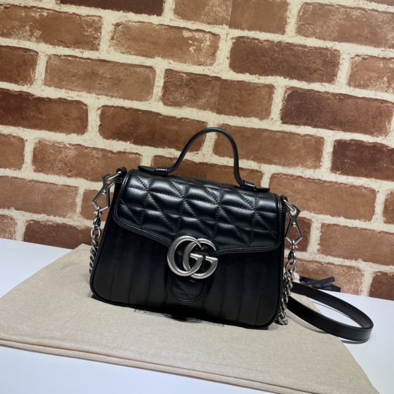 G*u*i top handle bags